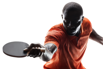 Focused male table tennis player in orange shirt hitting ball with paddle isolated on transparent background