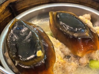 Steamed century egg and minced pork dim sum