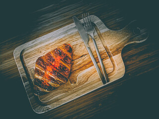 Gourmet Croissant with Red Topping on Rustic Wooden Board