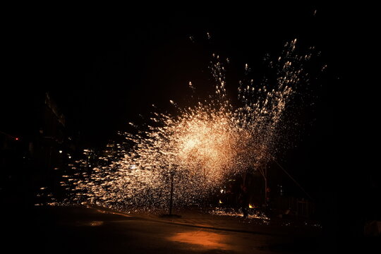 Datiehua, a Chinese intangible cultural heritage, features stunning iron sparks. iron - tapping fireworks in Jiangmen,Guangdong,China.