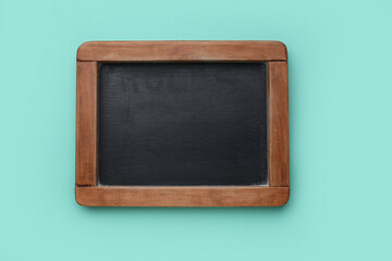 Blank chalkboard on green background. Rules concept