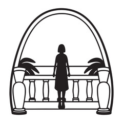 A woman looks out the window