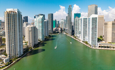 Naklejka premium Famous landmarks of Miami Brickell from above. Drone view of the Brickell in Miami city. Business in Brickell district. Biscayne Bay Florida iconic urban coastline in daylight.