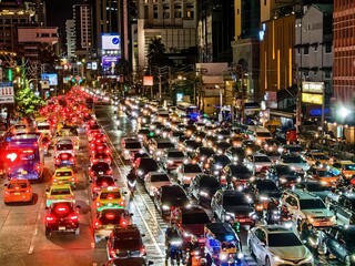 Intense night traffic jam on a busy Bangkok city street