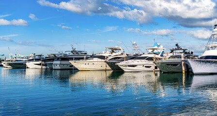 Yachting boat tourism. Motorboat sea marina. Luxury yacht marina. Docked luxurious yacht boat....