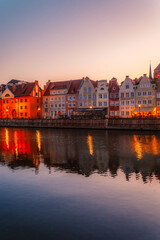 Naklejka premium Gdansk with Motlawa river in Poland. Old town colourful house with Stragania Gate