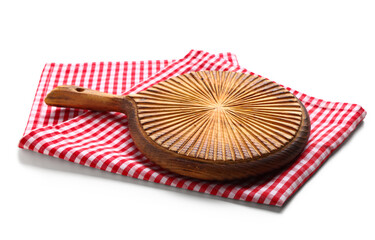 Wooden cutting board and checkered napkin on white background