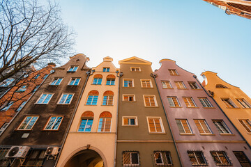 Gdansk with Motlawa river in Poland. Old town colourful house with saint Marys church i main square.