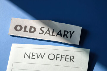Old salary comparison with new offer on a blue background.