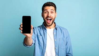Excited Man Showcasing Smartphone with Blank Screen