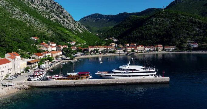 Luxury Yacht Dock At The Terminal In Trstenik Village In Peljesac Peninsula, Croatia. - aerial shot