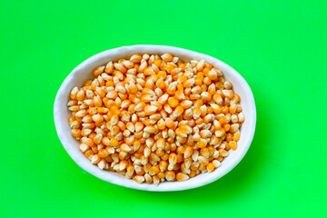 Yellow raw unpopped popcorn kernels