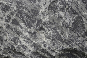 Grey rock surface with natural texture