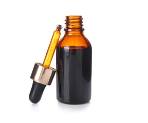 Bottle with iodine and pipette isolated on white background, closeup