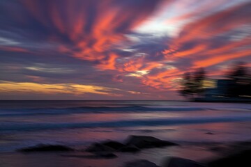 a surreal bokeh blurred dramatic sunset over the ocean