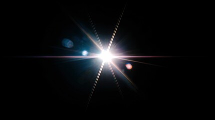 A bright, shining star with lens flare on a deep black background