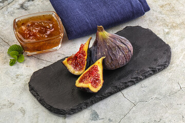 Purple ripe fig with cut