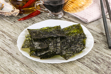 Green nori seaweed chips with soya sauce