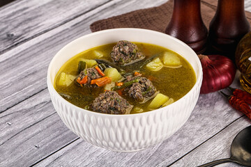 Soup with beef meatballs and vegetables