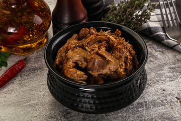Shredded slow cooked pork meat