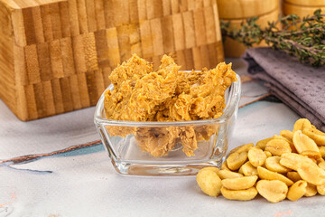 Crunchy peanut butter fat product