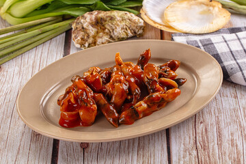 Razor shell mollusk with sauce