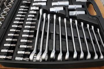 Toolbox with many different tools, including wrenches and screwdrivers. Tools in a set. Universal...