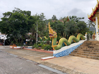 A colorful dragon in front of a temple. Karon Temple, Phuket, Thailand