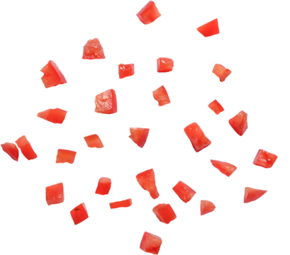 A collection of small, diced red pieces resembling chopped tomatoes, arranged randomly on a white background.