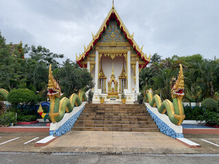 Dragon Palace, Buddhist Temple of Thailand
A bright dragon in front of the temple. Dragon Palace. Karon Temple.