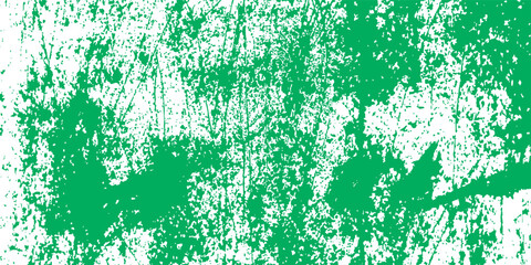 Abstract grunge background with green paint splatter texture on white surface for creative design projects