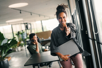 Smiling black successful business woman, freelancer, coworker female leader using digital device