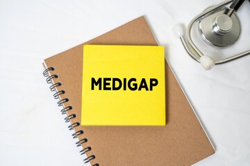 medical concept. Medigap writing concept on sticky notes isolated on white background.