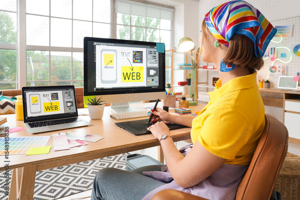 Poster beautiful web designer working with graphic tablet at table in office