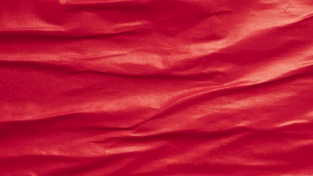 red crumpled and creased glued wrinkled paper poster texture background stop motion