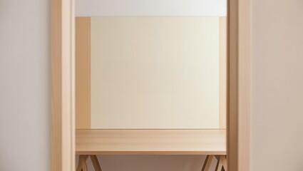 Fototapeta premium Minimalist Workspace Setup with Copy Space, Featuring a Light Wood Desk and Neutral Tones