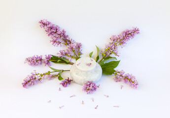 Empty round stone podium or pedestal for advertising floral cosmetics or small summer goods on a...