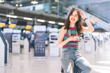 Beautiful traveller passenger asian woman at international airport terminal  journey on the go vacation holidays