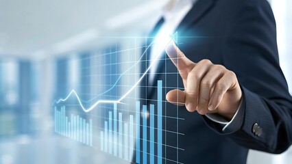Businessman pointing to a growing graph chart