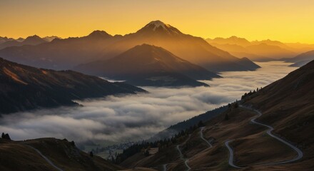 Scenic Sunrise Over Misty Mountain Valley with Winding Road Golden Hour Landscape Photography