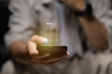Businessman Hand pressing passcode button on virtual screen to unlock, security system, cyber security, technology network concept.