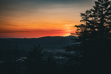 Idaho Sunset behind a mountain.