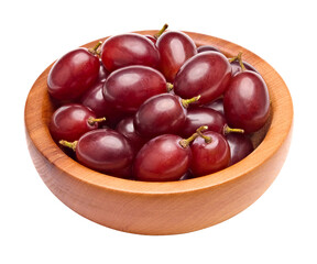 red grapes berries in wooden bowl isolated on white background. clipping path