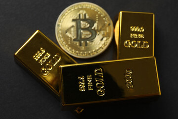 Bitcoin on a black background. gold coin cryptocurrency. Iron