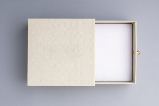 Drawer-style gift box with foam insert and gold knob, suitable for jewelry or premium women’s products