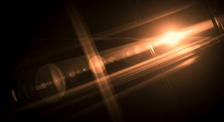 Abstract Golden Light Rays and Lens Flares on Dark Background