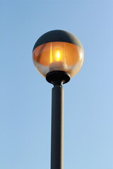 street lamp on blue sky background