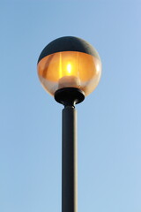 street lamp on blue sky