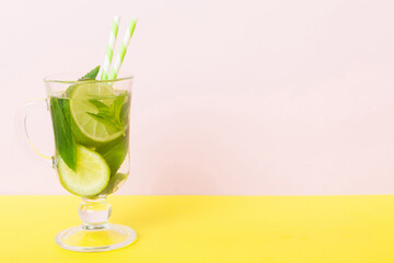 Mojito summer refreshing cocktail with ice and mint. mojito cocktail with lime, lemon and mint in a...