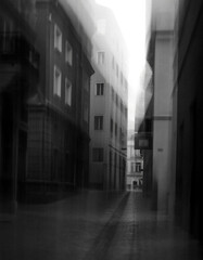 Modern architecture and blurred city street motion.